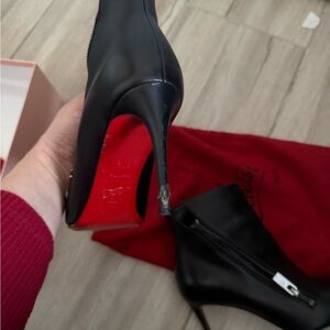 Christian Louboutin Black Heeled Boots with Red Sole